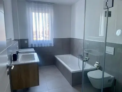 Ein Badezimmer in der Unterkunft KoschenOase Wohnung mit Seeblick 4 Personen