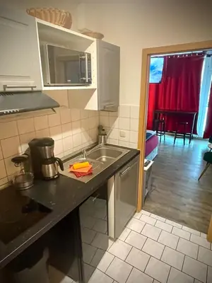 Küche/Küchenzeile in der Unterkunft Cozy Apartment in City Center