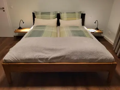 Ein Bett oder Betten in einem Zimmer der Unterkunft Luxuriöses Ferienhaus - Lottas Landhaus