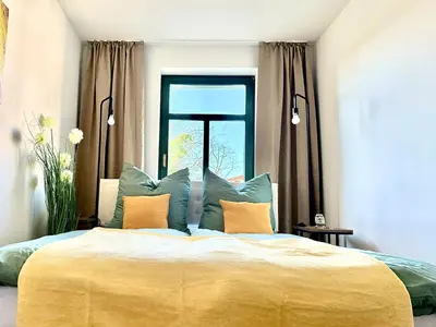 Ein Bett oder Betten in einem Zimmer der Unterkunft Stylish 2R apartment