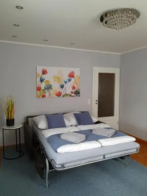 Ein Bett oder Betten in einem Zimmer der Unterkunft Grossenhain Ferien