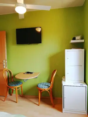 TV/Unterhaltungsangebot in der Unterkunft Privatzimmer mit Aussicht