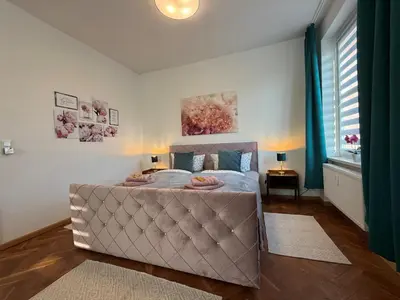Ein Bett oder Betten in einem Zimmer der Unterkunft Wohnperle - Oskar06