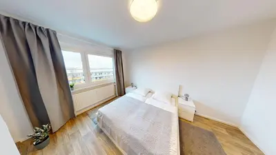 Ein Bett oder Betten in einem Zimmer der Unterkunft Modernes 3-Raum-Appartement, WLAN