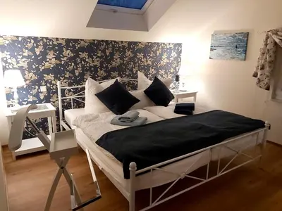 Ein Bett oder Betten in einem Zimmer der Unterkunft Villa Tini