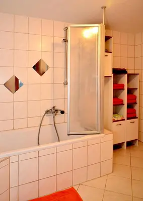Ein Badezimmer in der Unterkunft FeWo - 