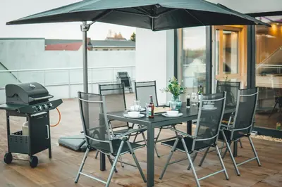 Ein Patio oder anderer Außenbereich in der Unterkunft ProZone Gaming Apartment