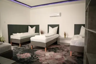 Ein Bett oder Betten in einem Zimmer der Unterkunft ProZone Gaming Apartment