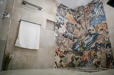 Ein Badezimmer in der Unterkunft ProZone Gaming Apartment