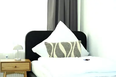 Ein Bett oder Betten in einem Zimmer der Unterkunft ASYA HOME Zentral, Balkon, Netflix, Gratis Kaffee und Tee