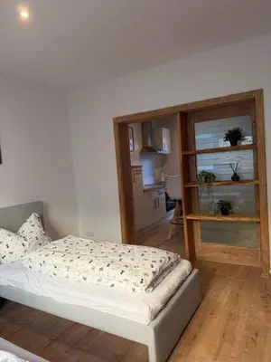 Ein Bett oder Betten in einem Zimmer der Unterkunft Ferienwohnung Schwarze Elster