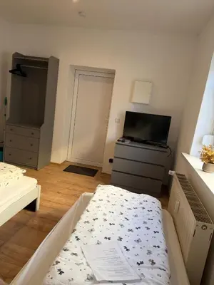 Ein Bett oder Betten in einem Zimmer der Unterkunft Ferienwohnung Schwarze Elster