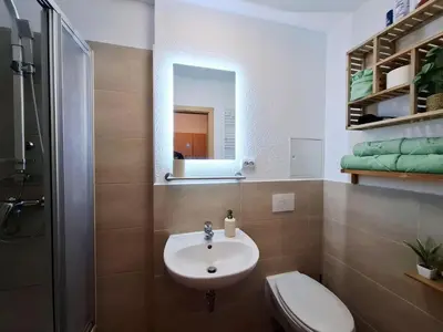 Ein Badezimmer in der Unterkunft Ferienwohnung im Zschopauer Herzen