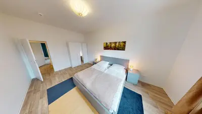 Ein Bett oder Betten in einem Zimmer der Unterkunft 3-Raum-Appartement im Stadtteil Kapellenberg, WLAN