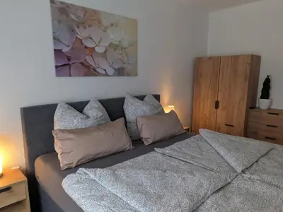 Ein Bett oder Betten in einem Zimmer der Unterkunft Ferienwohnung Zur Coleus-Farm