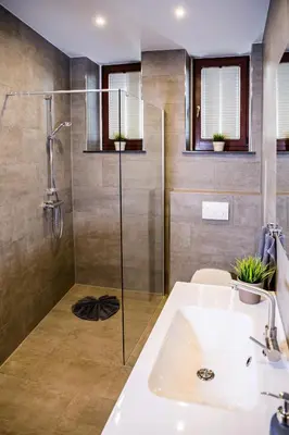 Ein Badezimmer in der Unterkunft DD Apartments