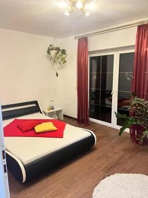 Ein Bett oder Betten in einem Zimmer der Unterkunft MyHome Tharandter Wald