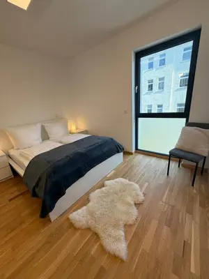 Ein Bett oder Betten in einem Zimmer der Unterkunft ElbeCity Apartment