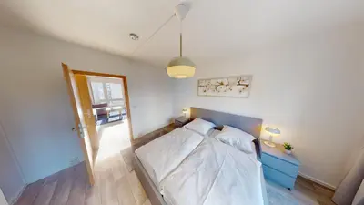Ein Bett oder Betten in einem Zimmer der Unterkunft 3-Raum-Appartement nahe Stadtpark, WLAN