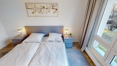 Ein Bett oder Betten in einem Zimmer der Unterkunft 3-Raum-Appartement nahe Stadtpark, WLAN