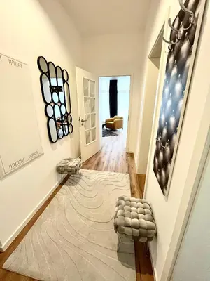 Ein Bett oder Betten in einem Zimmer der Unterkunft ANER2 STYLISCHE Ferienwohnung mit Sauna in Dresden Weißer Hirsch