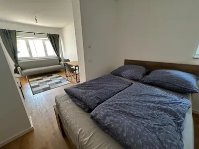 Ein Bett oder Betten in einem Zimmer der Unterkunft Barrierearmes Mini Apartment