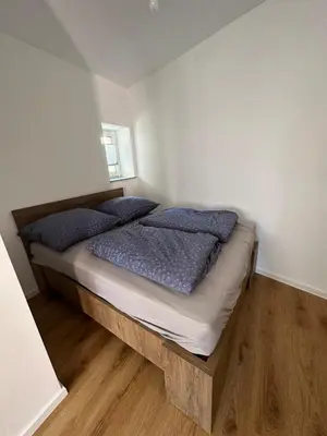 Ein Bett oder Betten in einem Zimmer der Unterkunft Barrierearmes Mini Apartment