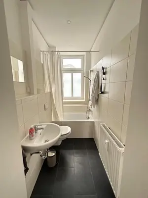 Ein Badezimmer in der Unterkunft Gemütliche Wohnung mit Hochbett