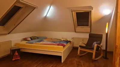 Ein Bett oder Betten in einem Zimmer der Unterkunft Villa Rennerberg