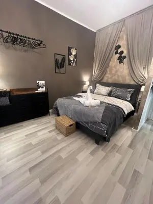 Ein Bett oder Betten in einem Zimmer der Unterkunft Stübchen am Theaterplatz