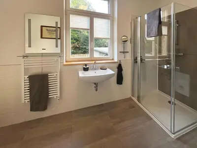 Ein Badezimmer in der Unterkunft Wauermühle