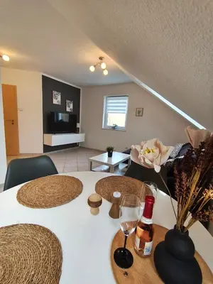 Ein Sitzbereich in der Unterkunft Ferienwohnung Familie Günther Warmbad