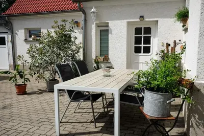 Ein Patio oder anderer Außenbereich in der Unterkunft Pension & Ferienwohnung Zum Waldblick