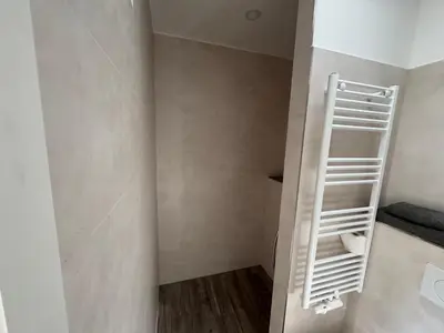 Ein Bett oder Betten in einem Zimmer der Unterkunft Pension Hertel