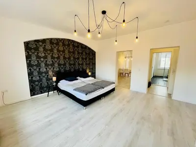 Ein Bett oder Betten in einem Zimmer der Unterkunft Mitten in Meißen moderne Ferienwohnung No 5