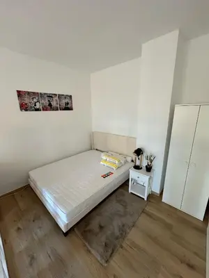 Ein Bett oder Betten in einem Zimmer der Unterkunft RoCo Appartment