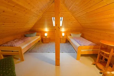 Ein Bett oder Betten in einem Zimmer der Unterkunft Falkenstein Hütten Haus Waldluft