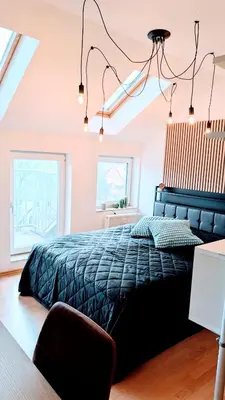 Ein Bett oder Betten in einem Zimmer der Unterkunft Compact Nordic Nest, WLAN, E Roller, SmartTV, Waschtrockner