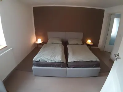 Ein Bett oder Betten in einem Zimmer der Unterkunft Fewo Gartenblick