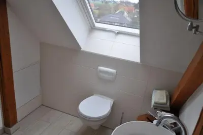 Ein Badezimmer in der Unterkunft Pension AM REICHEN BERG