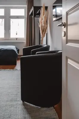 Ein Sitzbereich in der Unterkunft One4Five Apartments, Stadthaus, gemütliches Wohnen in Dresden