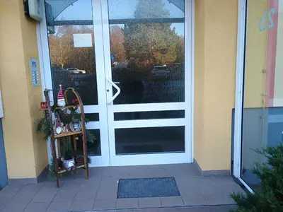 Eine Fassade oder ein Eingang zu Urlaub Oase