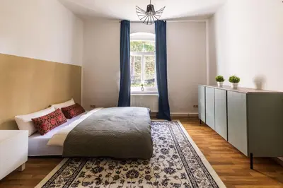 Ein Bett oder Betten in einem Zimmer der Unterkunft HohnsteinOase-Fasssauna und Kühlbecken-3 SZ-Parkplatz - Waschmaschine