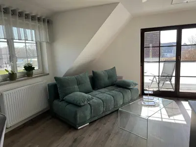Ein Sitzbereich in der Unterkunft Ferienwohnung Matka