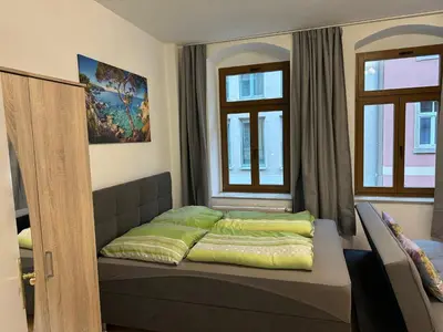 Ein Bett oder Betten in einem Zimmer der Unterkunft Linda Ninh Apartment 6 Altstadt