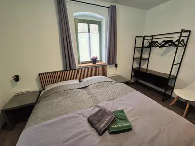 Ein Bett oder Betten in einem Zimmer der Unterkunft WellAktiv Geising