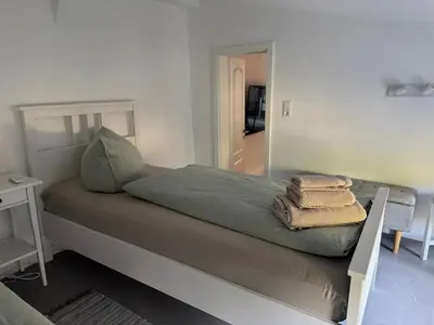 Ein Bett oder Betten in einem Zimmer der Unterkunft Dein Hideaway - Grimma entdecken und genießen