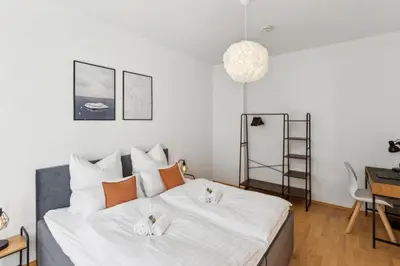 Ein Bett oder Betten in einem Zimmer der Unterkunft Simply Cozy by Simple Pleasures Apartments, Kaßberg, Messenähe, Highspeed WLAN
