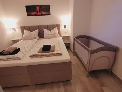 Ein Bett oder Betten in einem Zimmer der Unterkunft Stilvolle Fewo Vogelnest, barrierefrei, Smart-TV, Parkplatz