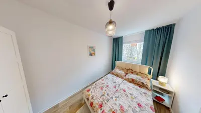 Ein Bett oder Betten in einem Zimmer der Unterkunft FeWo mit bodengleicher Dusche, 170m bis zur Bahnhaltestelle Linie 5, WLAN
